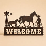 Western horse and cowboy welcome metal wall art sign on a light beige background with soft shadow, farmhouse entryway décor.