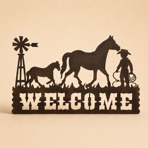 Western horse and cowboy welcome metal wall art sign on a light beige background with soft shadow, farmhouse entryway décor.