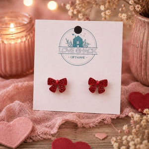 Mini Bow Stud Earrings on a 'Love Shack Giftware' card with decorative background