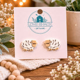 Adorable Mini Sheep Stud Earrings by Loveshack Giftware featuring cute white sheep designs on a branded display card.