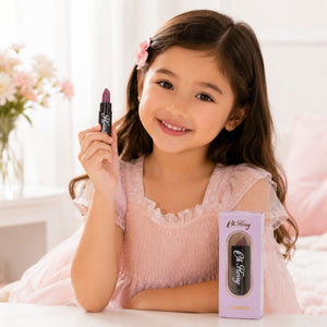 Child holding Oh Flossy Purple Natural Lipstick for Kids during pretend beauty play