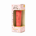 Oh Fussy Lip Gloss Watermelon in a pink box with a clear window showing the coral pink tube inside, decorated with small watermelon and star illustrations.