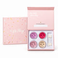 Oh Flossy Mini Makeup Set with eyeshadows, pink blush, lipstick and applicators in a pastel gift box