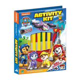 A boxed Paw Patrol activity kit with colorful marker barrels visible through a clear window on the front. The box features Paw Patrol characters and large 'ACTIVITY KIT' text on a white background.