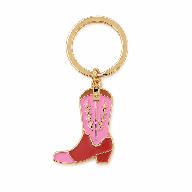 A pink cowboy boot enamel keyring featuring an enamel cowboy boot charm with pink and red sections and gold-tone decorative details, set against a plain white background.