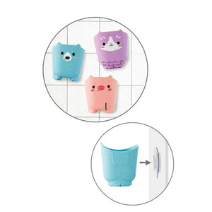 Animal bath cups with suction feature attached to bathroom wall