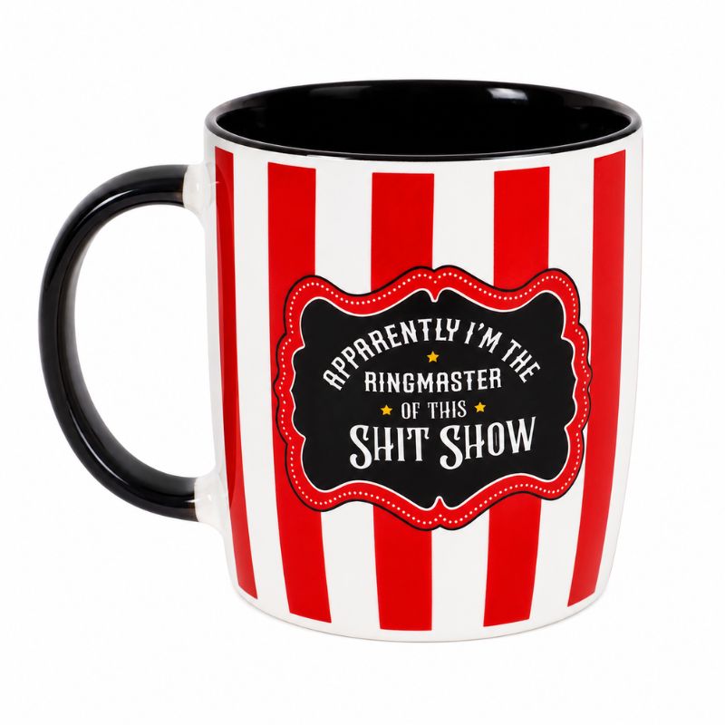 A ceramic mug Red Striped Ringmaster Mug with red and white vertical stripes, a black interior and handle, and a black label on the front that reads, 'APPEARENTLY I'M THE RINGMASTER OF THIS SHIT SHOW' in white text with small gold stars.