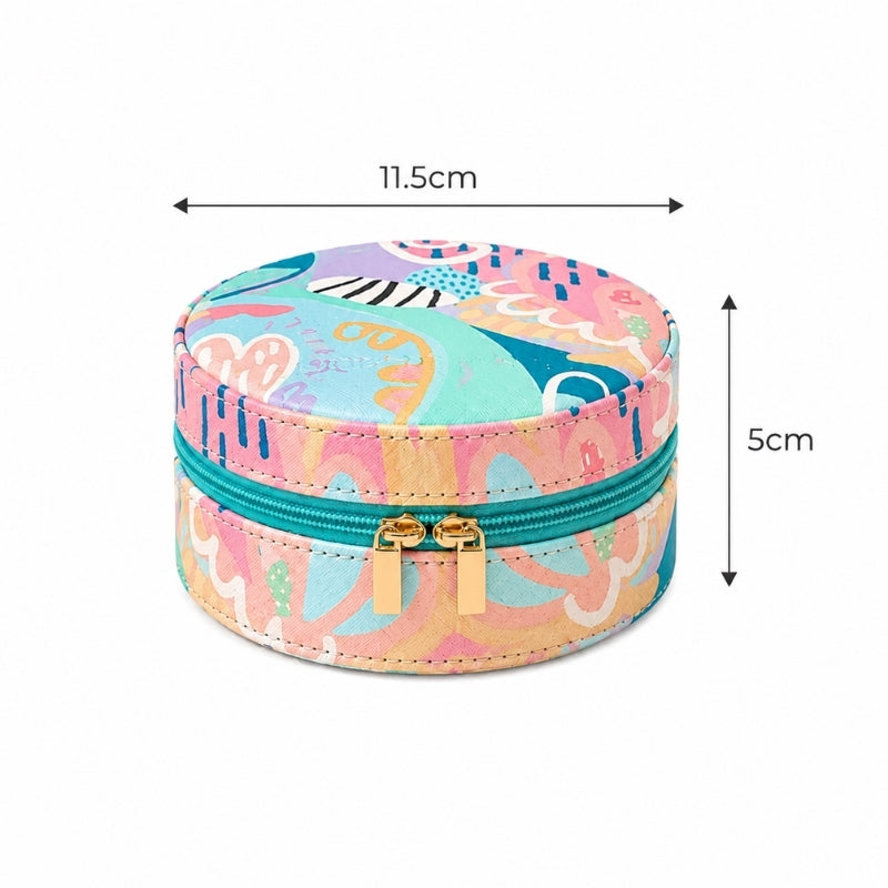 A Small Jewellery Case – Haven with a colorful abstract pattern in pink, teal, yellow, and orange, shown with dimension lines indicating a width of 11.5cm and height of 5cm.
