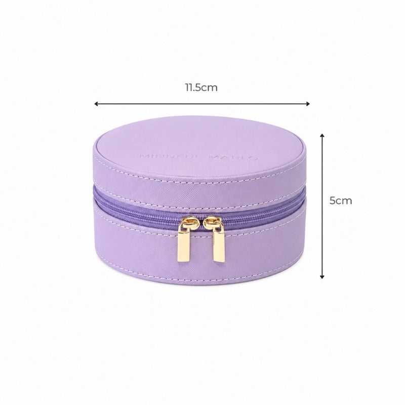 A Small Travel Jewellery Case_Violet with gold-tone zipper pulls, shown with dimension lines indicating a width of 11.5cm and a height of 5cm on a white background.