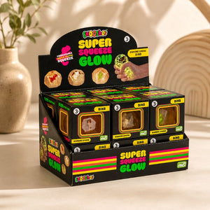 Smooshos Super Squeeze Glow Diamond Sphere Dino countertop display with premium lifestyle styling