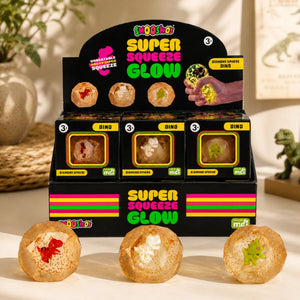 Smooshos Super Squeeze Glow Diamond Sphere Dino retail display in a modern tabletop setting