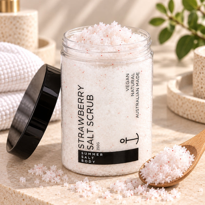 Open Strawberry Salt Scrub tub showing coarse exfoliating scrub texture with black lid