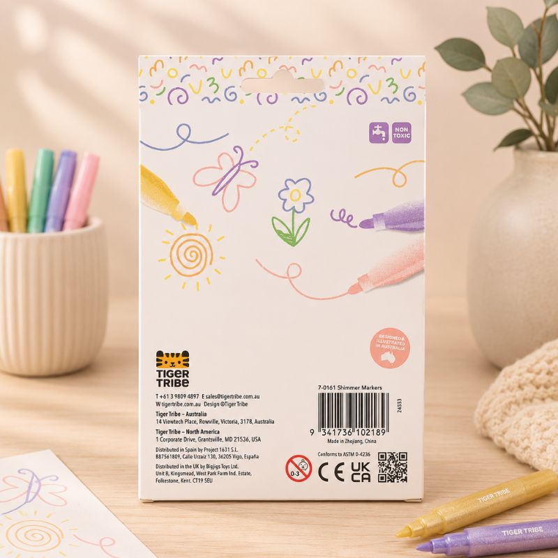 Tiger Tribe coloring book with markers on a wooden surface - Loveshack Giftware