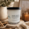 Love Shack Giftware Vanilla Patchouli and Sandalwood Soy Candle in a reusable glass jar with approximately 55 hours burn time and warm fragrance.