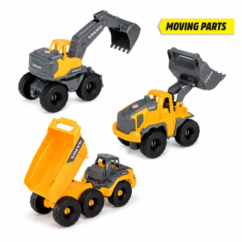 Three Volvo toy construction vehicles on a white background: an excavator, a wheel loader, and a dump truck. A yellow banner in the top right says 'MOVING PARTS'.