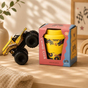 Wheelies Babychino Cup (4 oz.) and packaging on a wooden surface.