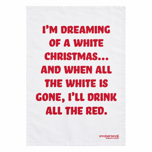 “White Xmas cotton tea towel hanging on an oven handle in a festive kitchen”