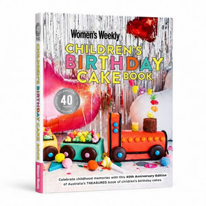 Children's Birthday Cake Book 40th Anniversary Edition hardcover featuring the iconic train cake cover design.